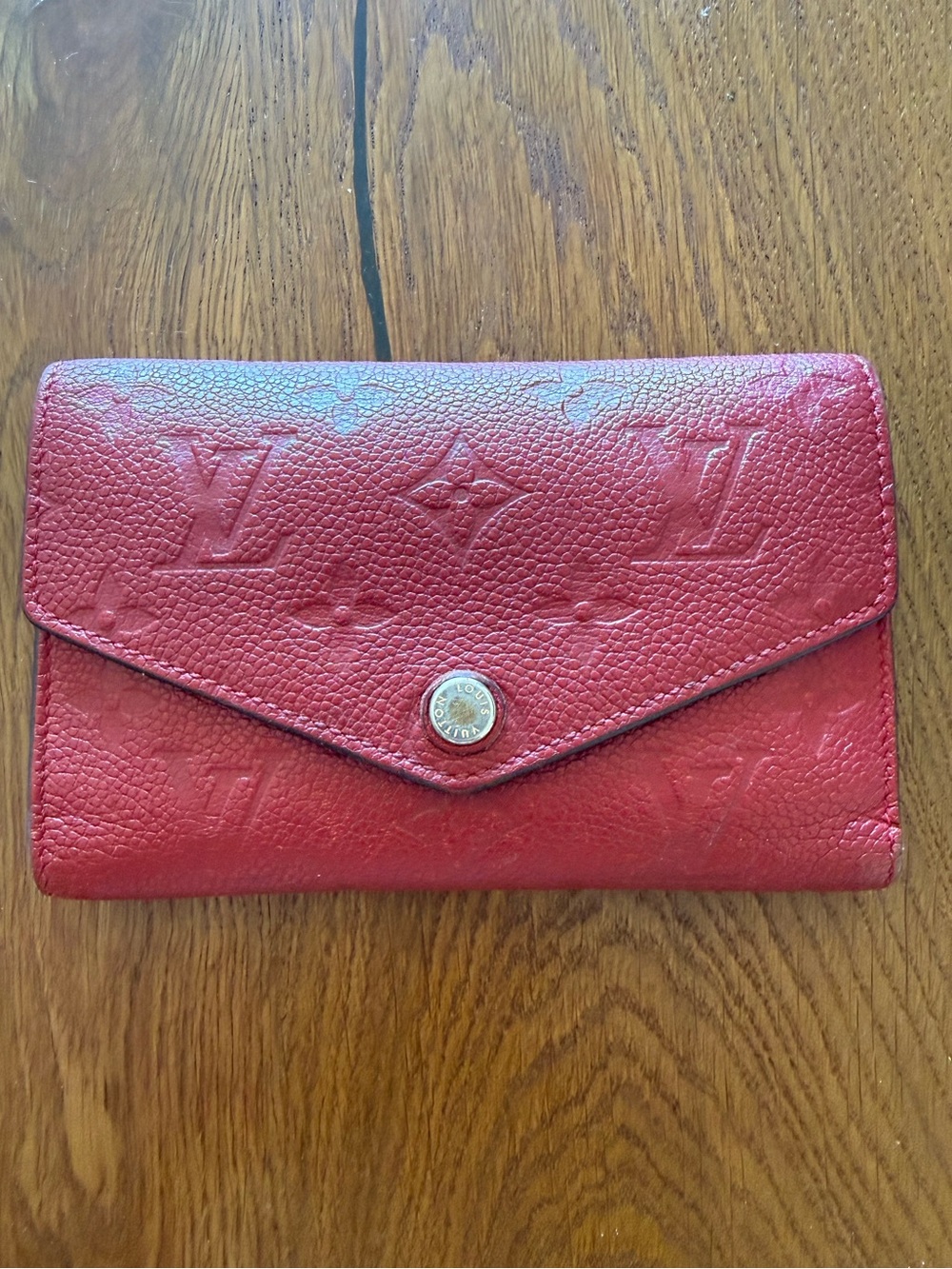 Louis Vuitton Embossed Monogram Envelope Curieuse Wallet in Red